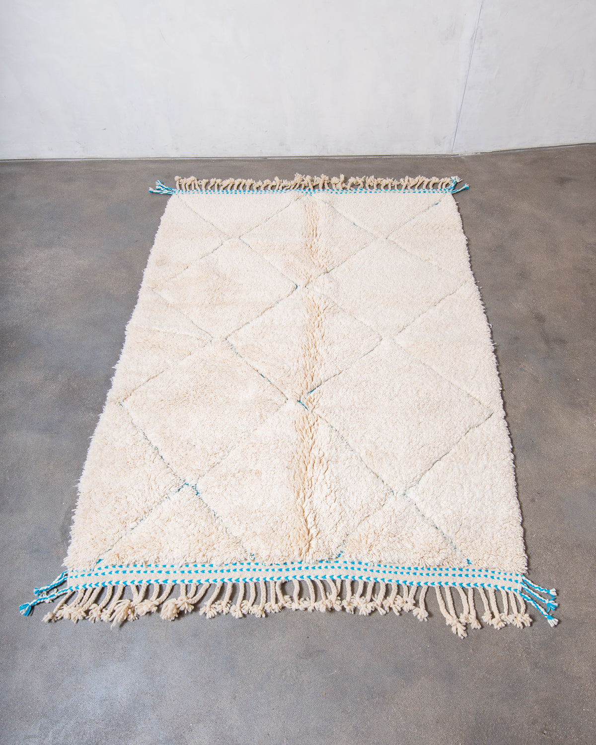 Modern, designer, handcrafted Berber rug from Morocco. Beniourain carpet with beautiful colours and patterns and fluffy wool texture.